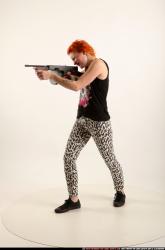 Woman Adult Athletic White Fighting with submachine gun Standing poses Casual