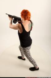 Woman Adult Athletic White Fighting with submachine gun Standing poses Casual