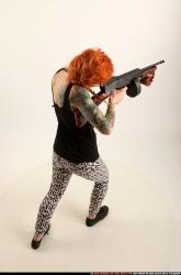 Woman Adult Athletic White Fighting with submachine gun Standing poses Casual