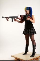 dolores-dual-tommyguns-pose2