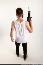 Man Adult Athletic White Fighting with submachine gun Standing poses Casual