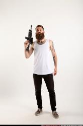 Man Adult Athletic White Fighting with submachine gun Standing poses Casual