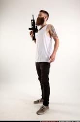 Man Adult Athletic White Fighting with submachine gun Standing poses Casual