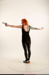 Woman Adult Athletic White Fighting with gun Standing poses Casual