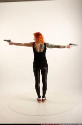 Woman Adult Athletic White Fighting with gun Standing poses Casual