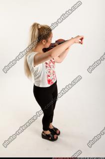kaya-standing-playing-violin