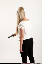 Woman Young Average Fighting with gun Standing poses Casual Asian