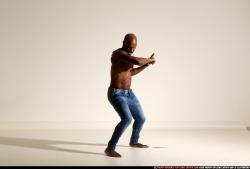 Man Adult Athletic Black Fighting with sword Moving poses Pants