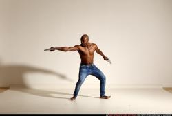 Man Adult Athletic Black Fighting with gun Moving poses Pants