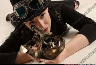 2017 08 CLAUDIA STEAMPUNK LAYING AIMING CROSSBOW PISTOL 10