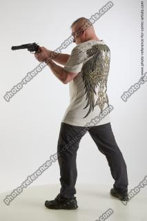 Fighting man with gun Yury