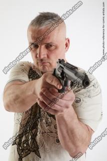 man fighting with gun yury 10