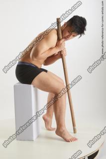 Resting Man With Wooden Stick Yoshinaga Kuri