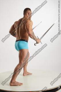 Fighting man with swords Garrott