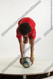 Soccer player with ball Dejavee Ford