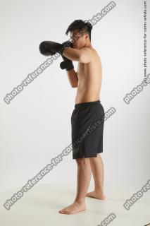 standing man with box gloves yoshinaga kuri 02