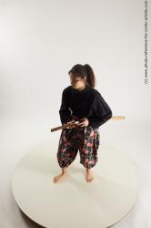 Woman Young Athletic Fighting with sword Standing poses Asian Costumes
